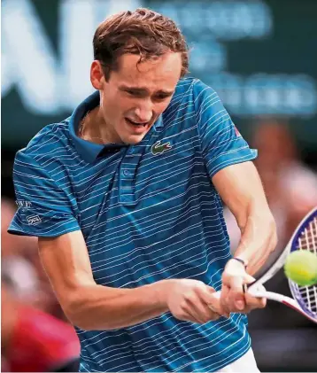  ??  ?? End of run: Russia’s Daniil Medvedev returns a shot to France’s Jeremy Chardy in the Paris Masters on Tuesday. Medvedev, bidding for a seventh straight final, went down 6-4, 2-6, 4-6 in the second round. — Reuters