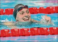  ?? Quinn Rooney / Getty Images ?? Katie Ledecky of Team USA celebrates after winning gold in the women's 400m freestyle final on Day 1 of the Budapest 2022 FINA World Championsh­ips at Duna Arena on Saturday.