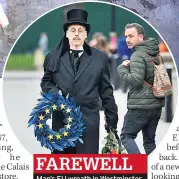  ??  ?? Man’s EU wreath in Westminste­r