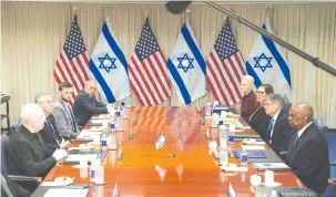  ?? (Kevin Lamarque/Reuters) ?? DEFENSE MINISTER Yoav Gallant (left) meets with US Secretary of Defense Lloyd Austin (right) yesterday at the Pentagon in Washington.