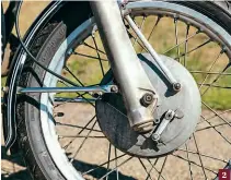  ??  ?? 2: The eight inch twin leading shoe front brake was perhaps becoming slightly old hat in 1972, with discs
looming large.