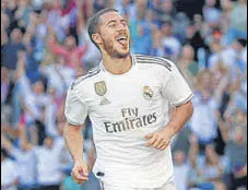  ?? REUTERS ?? Real Madrid's Eden Hazard celebrates scoring the team’s second goal against Granada.