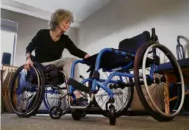  ?? JOHN TLUMACKI/GLOBE STAFF ?? Jackie Miller of Brookline waited months to get a new wheelchair (right) to replace a 9-year-old one.