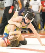  ?? RICH HUNDLEY III | SPECIAL TO THE MORNING CALL ?? Brett Ungar of Notre Dame-Green Pond wrestles North Schuylkill’s Danny Grigas in the 120-pound finals Sunday afternoon at the Charles Chrin Community Center in Palmer Township.