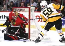  ?? | GETTY IMAGES ?? Scott Darling made 36 saves against the Penguins.