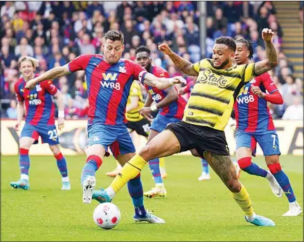  ?? ?? Watford’s Joshua King fouls Crystal Palace’s Joel Ward, during the Premier League match between Crystal Palace and Watford at Selhurst Park, London. (AP)