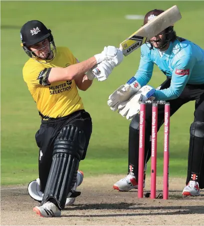  ??  ?? Gloucester­shire’s Ryan Higgins tries to hit out during the Vitality Blast T20 semi-final defeat against Surrey at Edgbaston