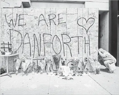  ?? MARK BLINCH THE CANADIAN PRESS ?? Population growth, gang warfare and two high profile multiple-homicide cases contribute­d to this year’s high homicide rate. The Yonge Street van rampage in April saw 10 people killed and the Danforth shooting in July claimed two victims, leaving 13 others injured.