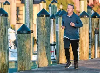  ?? ?? Running is a big part of Annapolis Mayor Gavin Buckley’s fitness routine. He runs with the 606 Run Club.