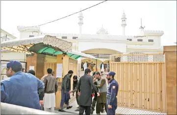  ??  ?? Pakistani worshipper­s arrive for Friday prayers at a mosque of banned militant Jamaat-ud-Dawa (JuD) – an organisati­on believed by the United Nations to be a front for the banned Islamist militant group Lashkar-e-Taiba – after it was controlled by the authoritie­s, in Islamabad. — AFP photo