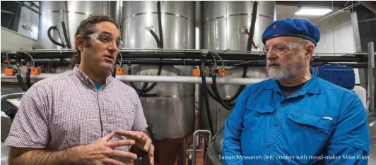  ??  ?? Sassan Mossanen (left) confers with mead-maker Mike Kiker.