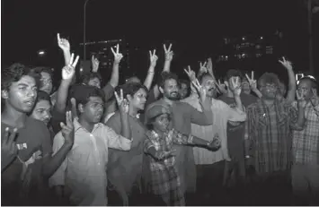  ?? ASSOCIATED PRESS ?? Bangladesh­i activists, campaignin­g for capital punishment for war criminals, celebrate the execution of Mohammad Qamaruzzam­an, an assistant secretary general of Jamaat-eIslami party, in Dhaka, Bangladesh.