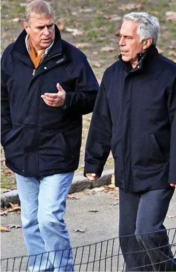  ??  ?? Together: Prince Andrew pictured with billionair­e paedophile Jeffrey Epstein