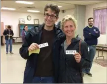  ?? EVAN BRANDT — DIGITAL FIRST MEDIA ?? Daniel Murphy, was voter number 700 at the Grace Lutheran Church polling place in Pottstown Tuesday afternoon. To his right is Amy Gazillo, voter 699. During the primary election in May only 259 votes were cast there all day.