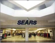  ?? LM OTERO — THE ASSOCIATED PRESS ?? This Thursday photo, shows an empty entrance to a Sears retail store in north Dallas.