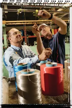  ?? : PHOTO JIM BUSH ?? G&amp;B Ropes uses coated filaments in order to reduce inter-fiber chafing and improve UV protection. Tim Ray (right) says he enjoys customizin­g core color schemes, which would not be possible if the core was coated after weaving.