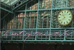  ??  ?? British artist Tracey Emin’s new neon sculpture “I Want My Time With You”, is pictured at St Pancras station in London.