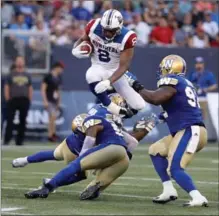  ?? CANADIAN PRESS FILE PHOTO ?? On Saturday, Nik Lewis (2) moved to No. 2 on the CFL’s all-time reception list behind Geroy Simon (1,029 catches). Lewis has 1,020.