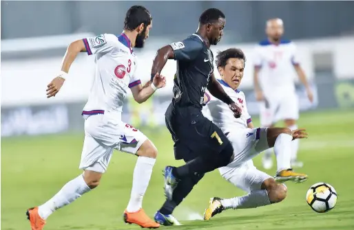  ?? Supplied photos ?? Shabab Al Ahli and Sharjah players tussle for the ball in the President’s Cup semifinal. The Dubai club joined Al Wasl, Al Wahda and Al Ain in the last four. —