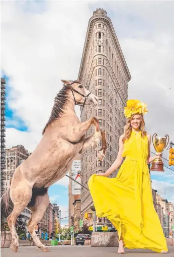  ?? Picture: JASON EDWARDS ?? David Jones ambassador Victoria Lee in front of New York City's Flatiron building, to mark the launch of the 2019 Stella Artois Caulfield Cup Carnival.