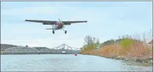  ?? STEVE FAGIN/SPECIAL TO THE DAY ?? A plane prepares to land at Goodspeed Airport next to the Connecticu­t River, just south of the East Haddam Swing Bridge.