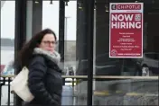  ?? NAM Y. HUH — THE ASSOCIATED PRESS ?? A hiring sign is displayed at a Chipotle restaurant in Schaumburg, Ill., on Monday.