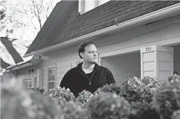  ?? MARY MATHIS/THE NEW YORK TIMES ?? Garth Greenwell, author of the new novel “Cleanness,” at his home in Iowa City, Iowa.