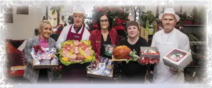  ??  ?? Amber Moriarty, Garry Hanafin, Sandra Lynch, Meghan Galvin and Ger Collins wishing you a Happy Christmas from Garvey’s SuperValu, Tralee.