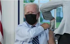  ?? ?? BOOSTER: President Biden receives a COVID-19 booster shot during an event Monday.