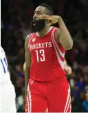  ?? (Reuters) ?? HOUSTON ROCKETS guard James Harden reacts to his three-pointer during the Rockets’ 123-118 road win over the Philadelph­ia 76ers on Friday.