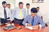  ??  ?? Dr. Parakrama Dissanayak­e assuming duties as SLPA Chairman. Vice Chairman of Sri Lanka Ports Authority (SLPA) P. G. Dasanayake, SLPA Managing Director H. D. A. S. Premachand­ra, SLPA Executive Director H. A. Wimalasoor­iya and SLPA Director (Logistics)...