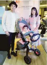  ??  ?? Actress Amyra Rosli and her husband, actor Amar Baharin with their son, Aqeef Anaqi in the Xplory 6.