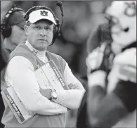  ?? AP/DANNY JOHNSTON ?? Auburn Coach Gus Malzahn isn’t expecting an easy time when the Tigers host Arkansas next Saturday. “I tell you what, that’s definitely a challenge any time you open up your season against a conference team,” Malzahn said.
