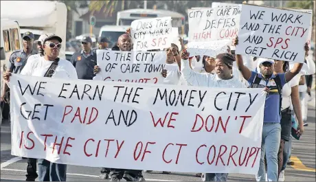  ?? Picture: BHEKI RADEBE ?? MARCHING MARSHALS: Striking parking marshals marched to the premier’s office to deliver a petition regarding their labour rights.