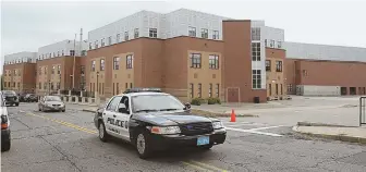  ?? STAFF PHOTO BY ANGELA ROWLINGS ?? NO RISK: Students at the Parthum school complex in Lawrence returned to class yesterday following the smell of gas, which came from a boiler and deemed not a risk.