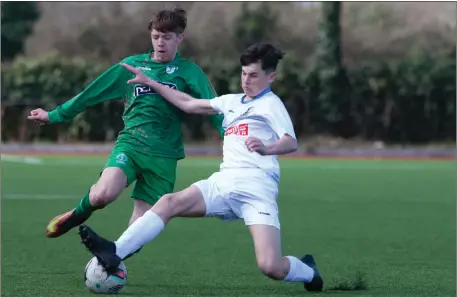  ??  ?? Kerry’s Jordan Barry in action with Evan Weir (UCD) in the SSEAirtric­ity U-17 League at Mounthawk Park,Tralee on Sunday