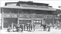  ?? COURTESY THE LOS ALAMOS COMMERCE & DEVELOPMEN­T CORP. ?? Students and staff prepare for a pack trip in front of the Big House.