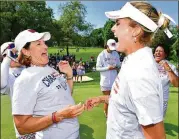  ?? STUART FRANKLIN / GETTY IMAGES ?? U.S. captain Juli Inkster (left) and Lexi Thompson are all smiles at the end of their 16½-11½ win over the Europeans in the Solheim Cup.