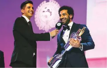  ?? AP ?? Liverpool’s Mohammad Salah being presented with the PFA Player Of The Year Award during the 2018 PFA Awards in London. Salah’s success story is the stuff of dreams for Egypt’s new generation.