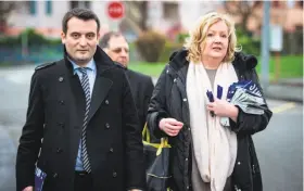  ?? Sebastien Bozon / AFP / Getty Images 2015 ?? Florian Philippot (left), the National Front’s second-in-command, seen here in 2015, quit his post months after his party suffered two major election defeats.