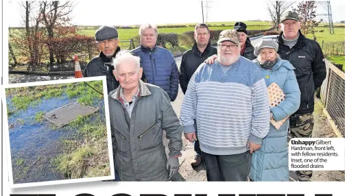 ?? ?? Unhappygil­bert Hardman, front left, with fellow residents. Inset, one of the flooded drains