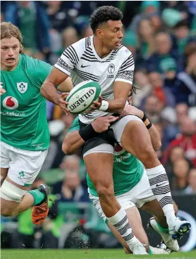  ?? AFP ?? Flying Fijians first five eight Ben Volavola sets up play against Ireland at the Aviva Stadium in Dublin on November 12, 2022. Photo: