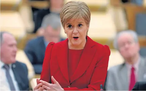  ?? Picture: Andrew Cowan. ?? First Minister Nicola Sturgeon addresses MSPs in Holyrood yesterday.