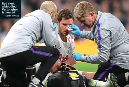  ?? GETTY IMAGES ?? Red alert: a bloodied Vertonghen is treated