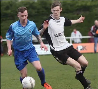  ??  ?? Fran Cleary of North End United is tracked by Shelburne’s Rob Kehoe.