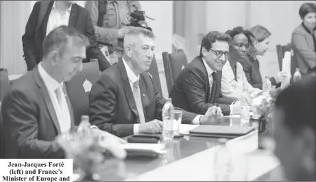  ?? ?? Jean-Jacques Forté (left) and France’s Minister of Europe and Foreign Affairs, Stéphane Séjourné (third from left) at the reading of the Joint Communique. (Office of the President photo)