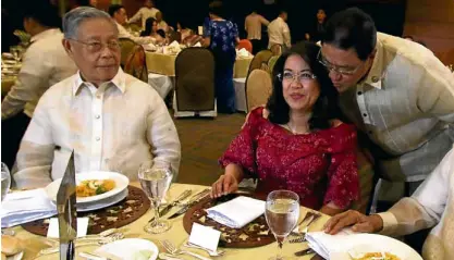  ?? —RICHARDA. REYES ?? WHAT’S THE BUSS? Supreme Court Chief Justice Maria Lourdes Sereno looks straight ahead as House Justice Chair Rey Umali appears to give her a buss during the 30th anniversar­y gala of the Judicial and Bar Council at the PICC in Pasay City on Friday....