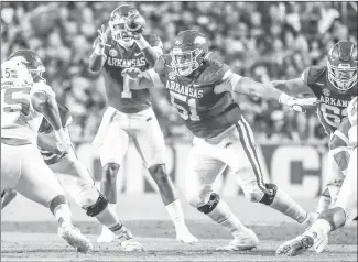  ?? Submitted Photo ?? Razorback junior offensive lineman Ricky Stromberg (#51) from Tulsa, Okla., sets up to pass block against Texas at Donald W. Reynolds Razorback Stadium in Fayettevil­le in a game played last season. Stromberg has earned a spot on the Rimington Trophy Preseason Watch List.