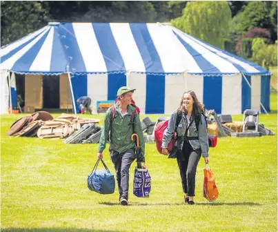 ?? Picture: Steve MacDougall. ?? Festival-goers Cameron Campbell and Charlotte Bell from Glasgow arrive at Solas Festival 2017 – Scotland’s midsummer celebratio­n of music and ideas.