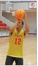  ??  ?? Jacksonvil­le senior Jaden Cope shoots a free throw during a scrimmage Monday.